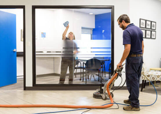 Man Cleaning An Office